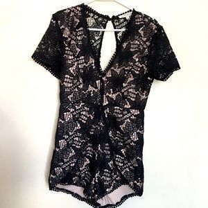 Lacey scalloped black romper.